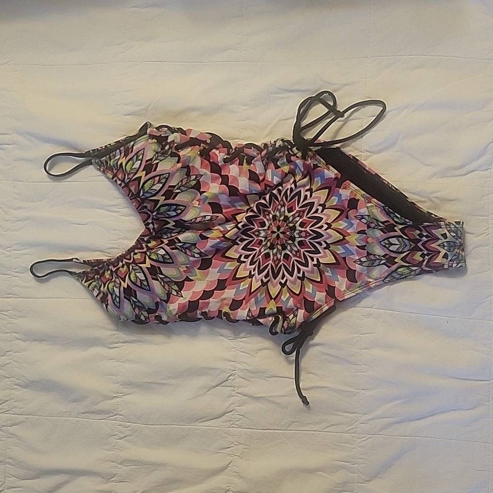 Juniors one piece bathing suit.  Made by Ymi.  Size Medium with blk lace up